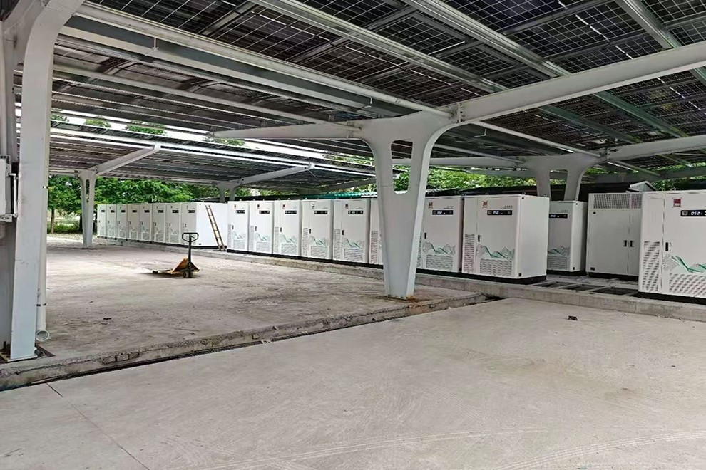 EV charging solutions for commercial sites and fleets Commercial EV charging site with charging equipment and parking area